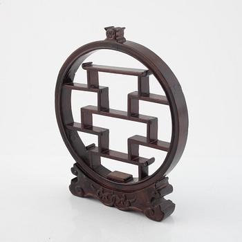 A Chinese wooden stand, 20th century.