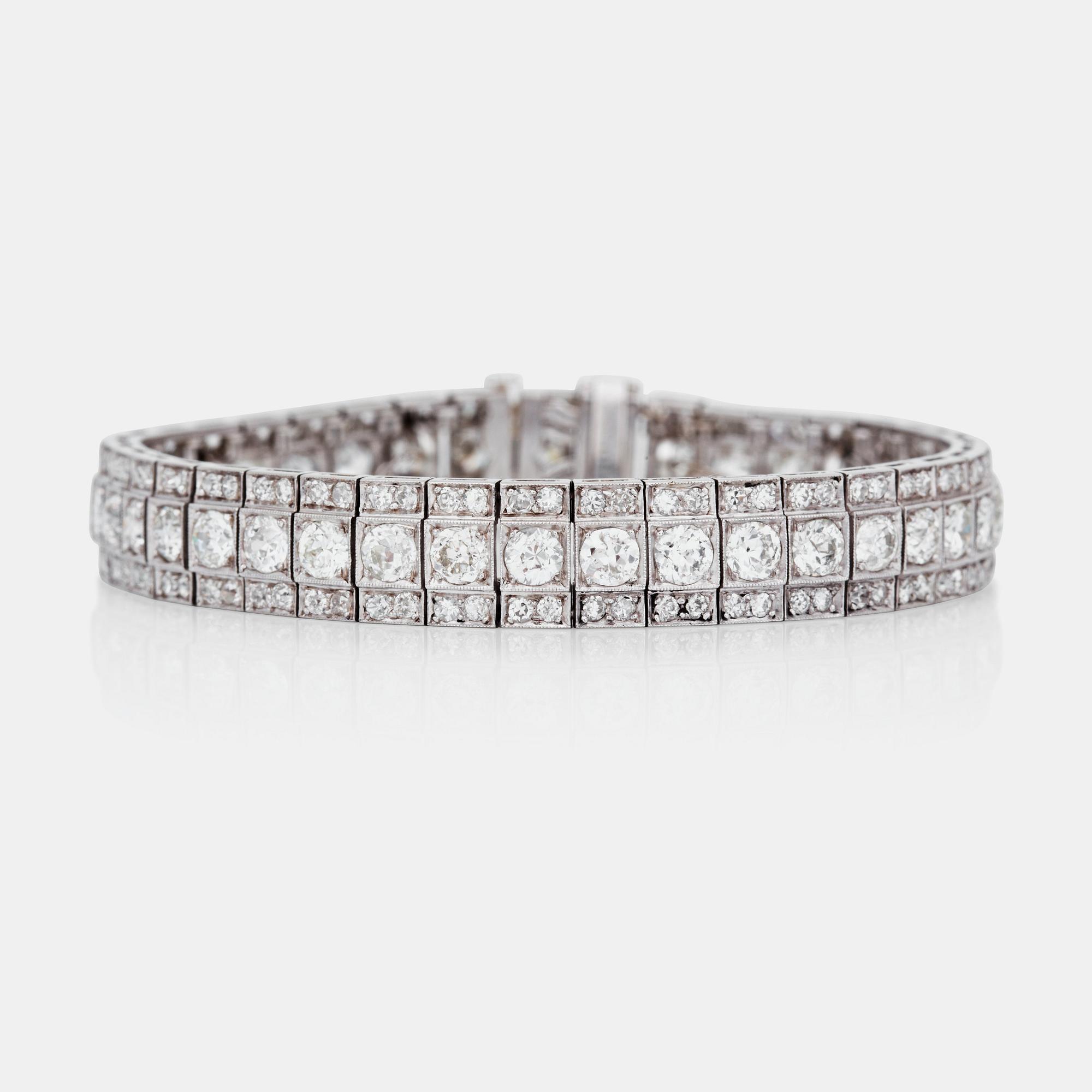 An Art Deco old-cut diamond bracelet. Total carat weight circa 11.00 cts.