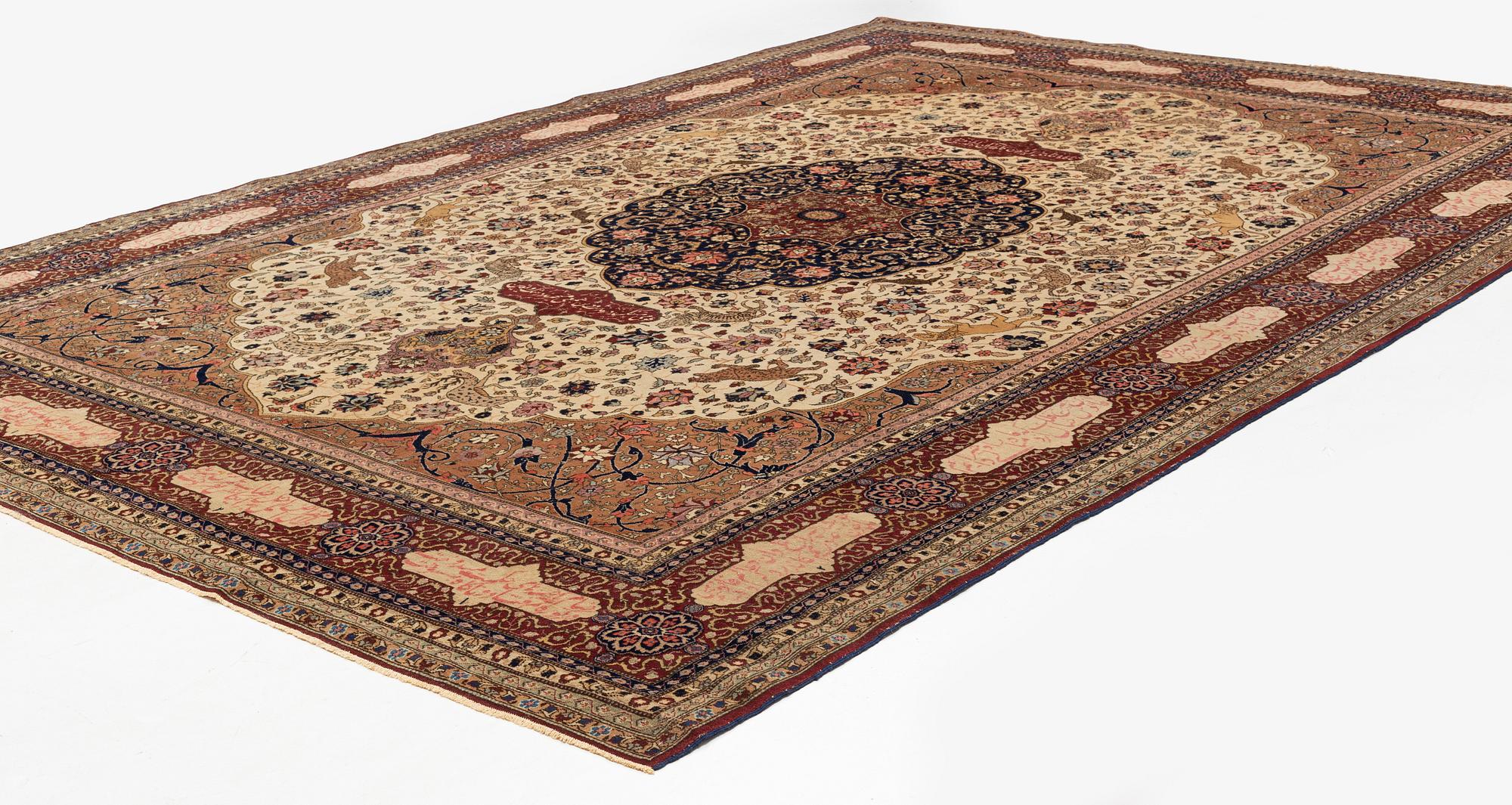 An antique Benlian Tabriz carpet, signed Jabarzade, ca 466 x 323 cm.