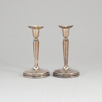 A pair of Swedish 20th century silver candlesticks, mark of Erik Löfman, Uppsala 1979.