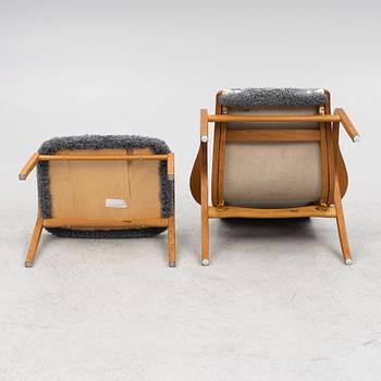 Yngve Ekström, a "Lamino" armchair with ottoman, Swedese, Sweden, late 20th century.