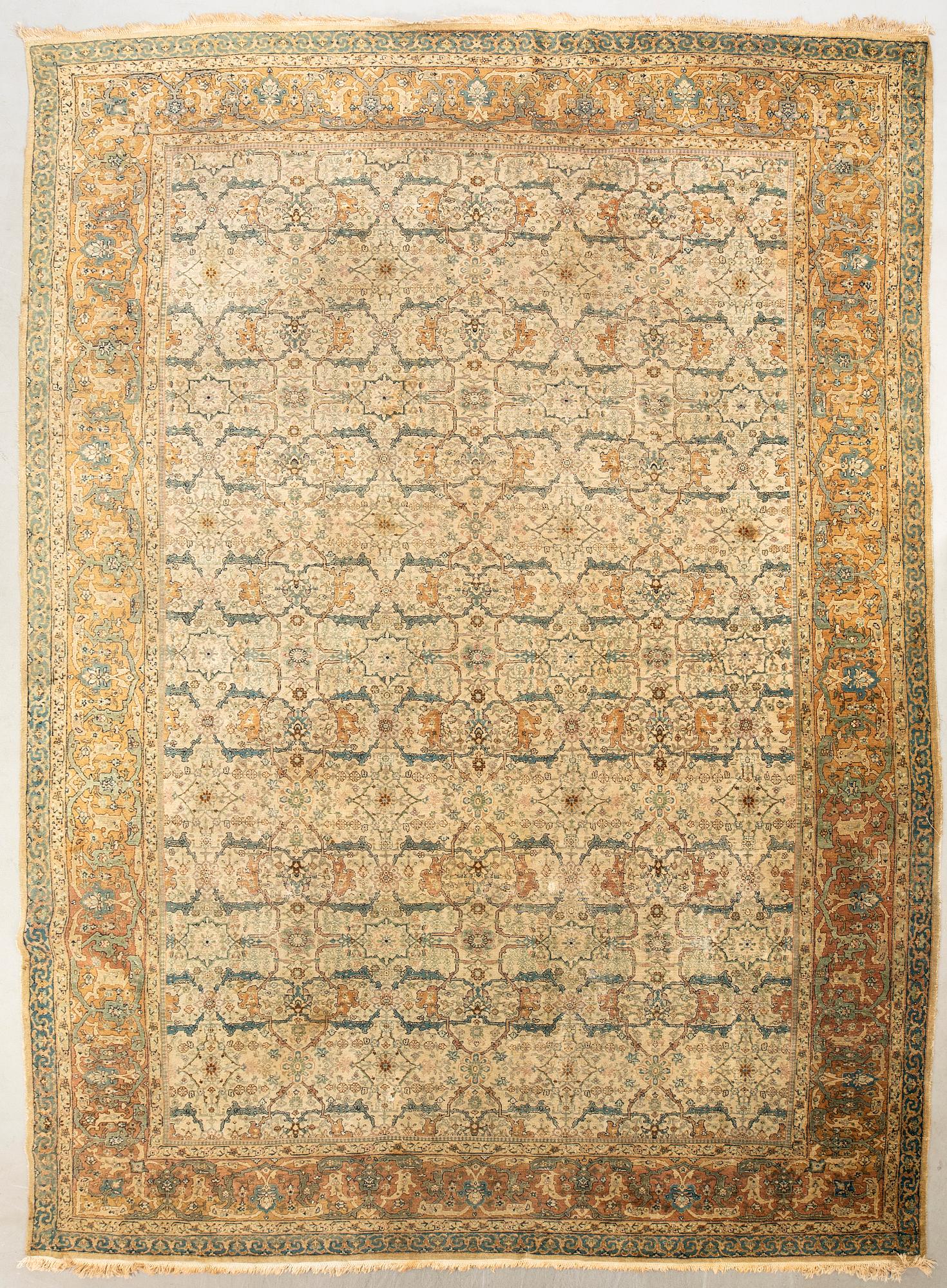 An antique West Persian carpet of Garrus design, c. 525 x 342 cm.