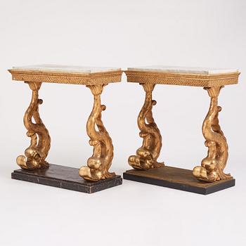 A matched pair of Swedish Empire console tables, first half of the 19th century.