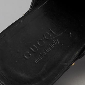 CLOGS by Gucci, size 40.