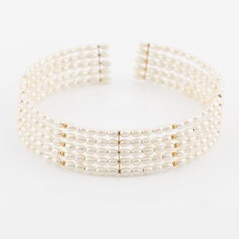 Five-row collar/choker with cultured freshwater pearls and 14K gold beads.