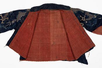A rare fragment of a silk four clawed 'dragon' jacket, late Ming dynasty/early Qing dynasty.