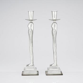 Edvin Öhrström, a pair of pewter and brass 'Egyptian' candlesticks, Svenskt Tenn, Sweden 1984.