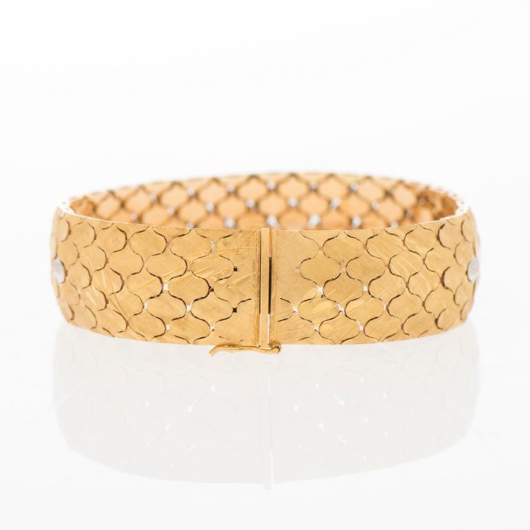 A BRACELET, 18K gold in three colours.