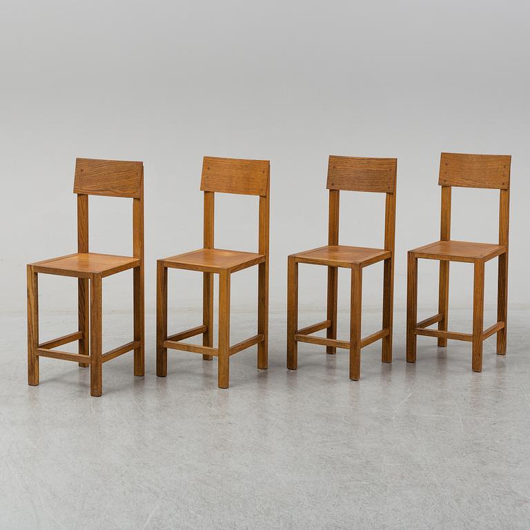 MARIO PRANDINA, an oak table and four chairs, Plinio Il Giovane, Italy.
