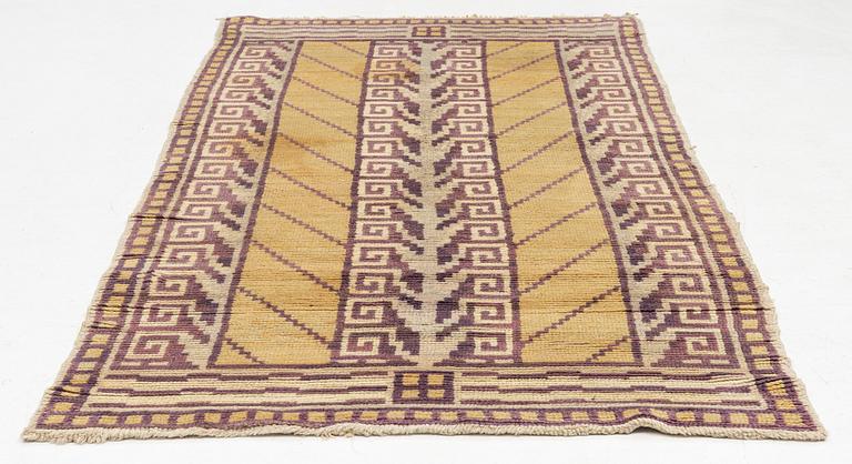 An Art Déco Pile Rug, 1930s. Circa 237 x 112 cm.