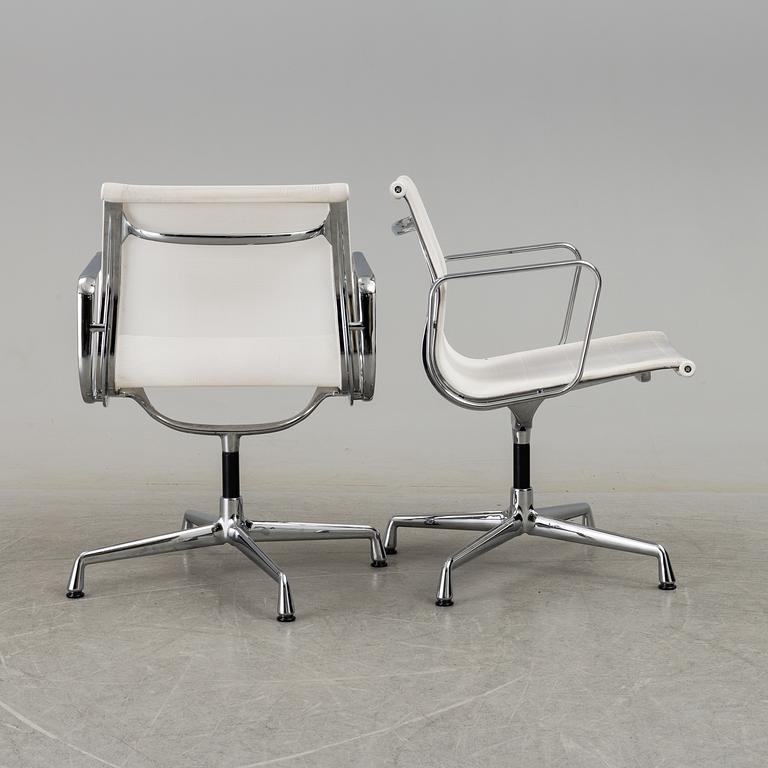 A pair of 'EA 108' desk chairs by Charles & Ray Eames for Vitra.
