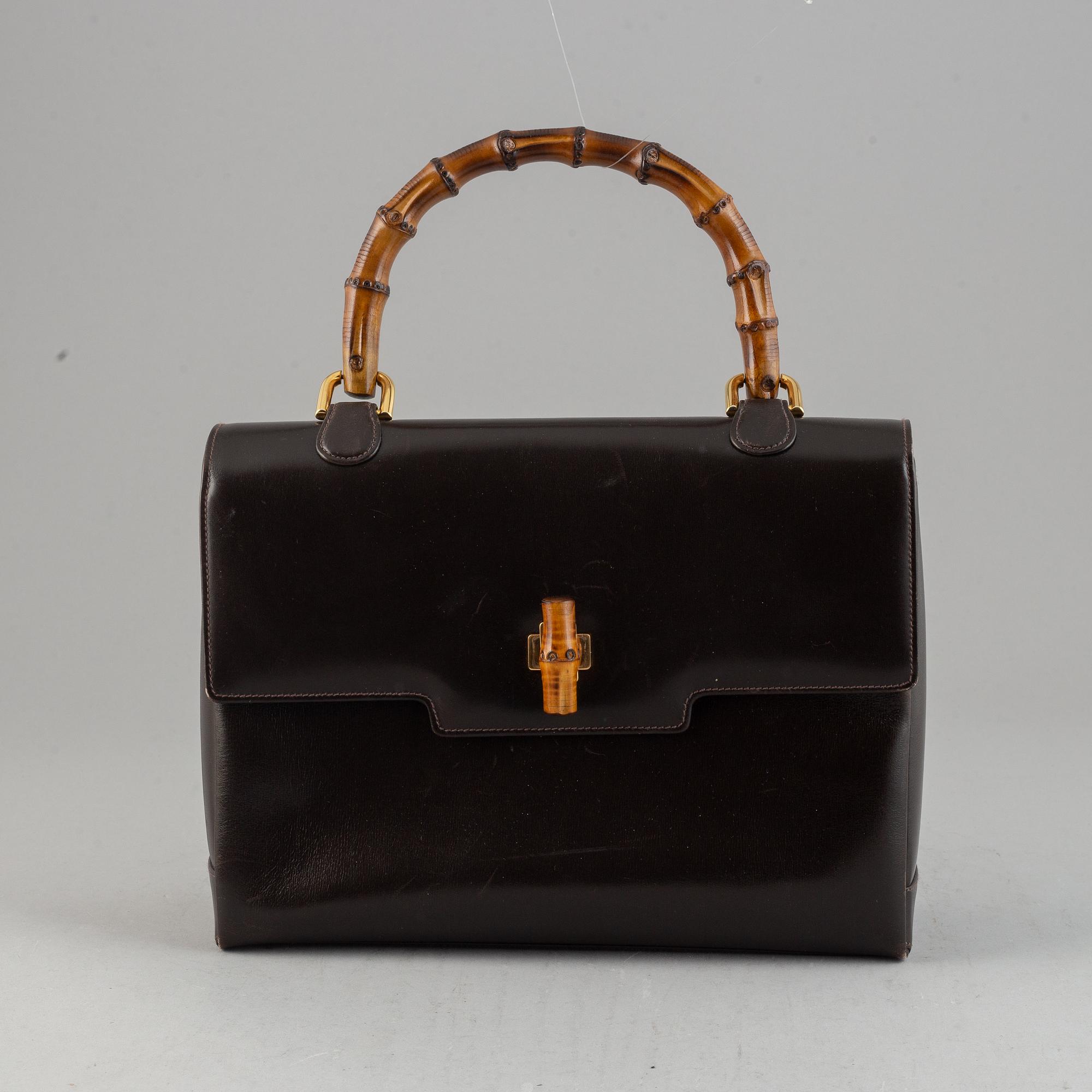 Gucci, a leather and bamboo bag.
