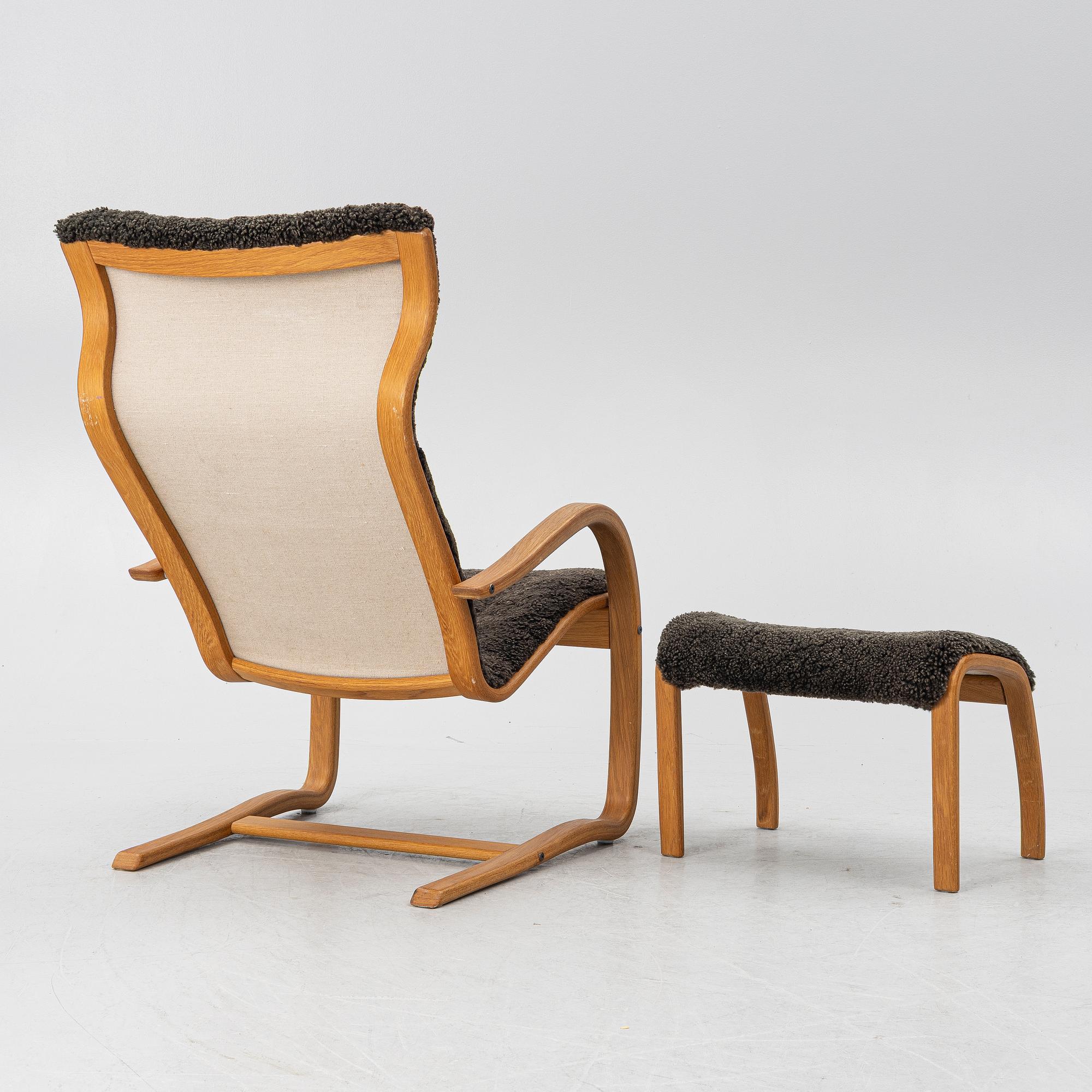 Jan Ekström, a "Gazell" armchair with a footstool, 21st century.