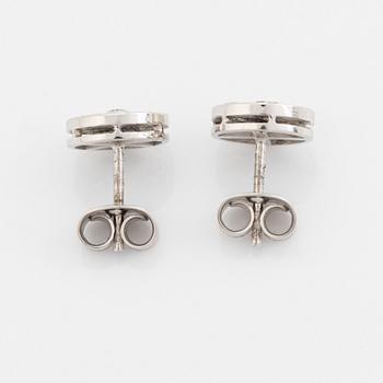 Brilliant and baguette cut diamond earrings.