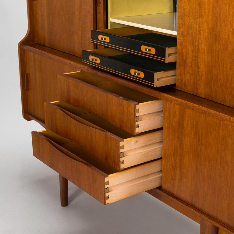 A Danish 1950s-60s cabinet with bar compartment.