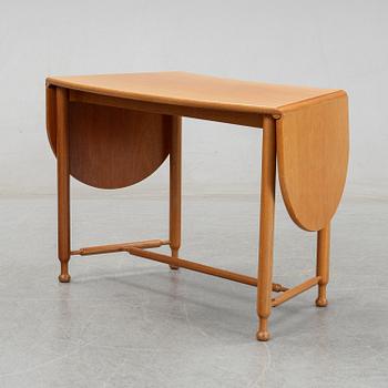 Josef Frank, a model 1133 folding table by Svenskt Tenn, Sweden.