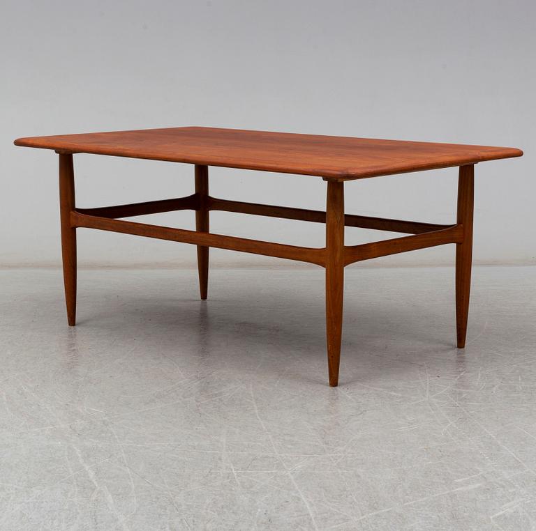 a teak coffee table from Denmark in the second half of the 20th century.