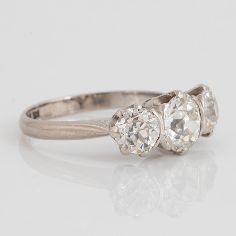 An 18K white gold ring set with old-cut diamonds.