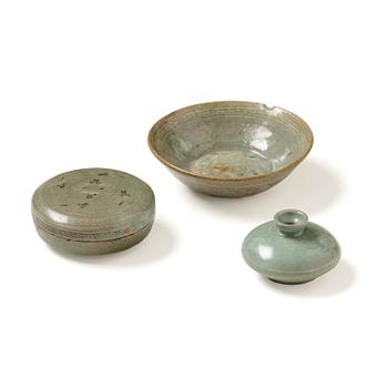 1039. A celadon glazed slip-decorated vase, bowl and box, Korea, Goryeo, 12/13th century.