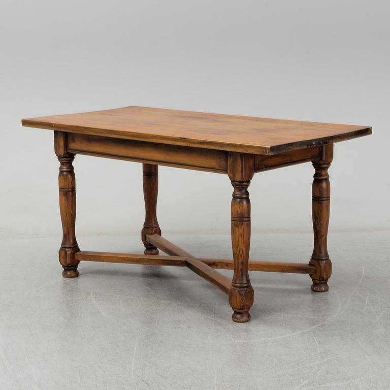 A pine table, circa 1900.