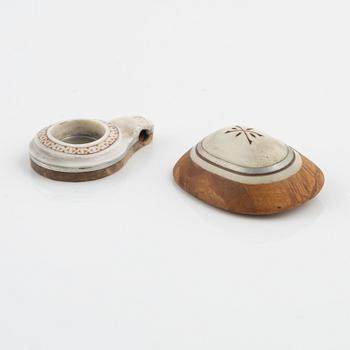 A brooch attributed to Per Sunna and a pendant, both in birch and engraved reindeer horn,