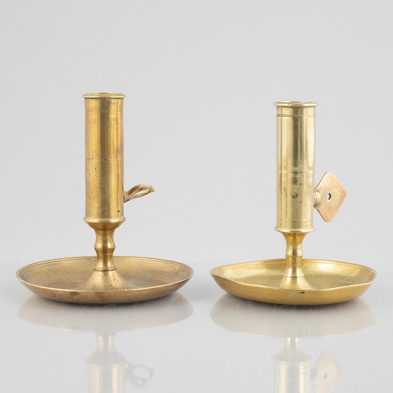 Six brass night candle sticks, 19th century.