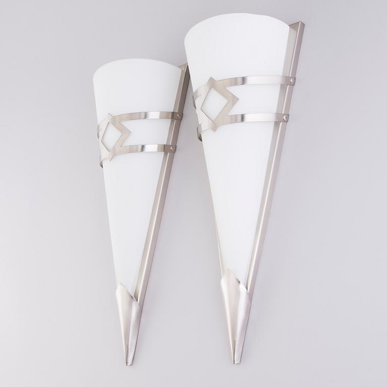 A pair of Swedish wall lamps in glass and metal by LampGustaf AB, late 20th Century.