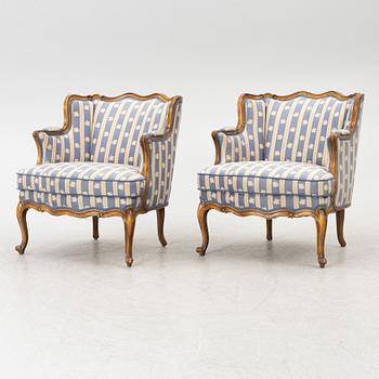 A pair of bergère armchairs, around 1900.