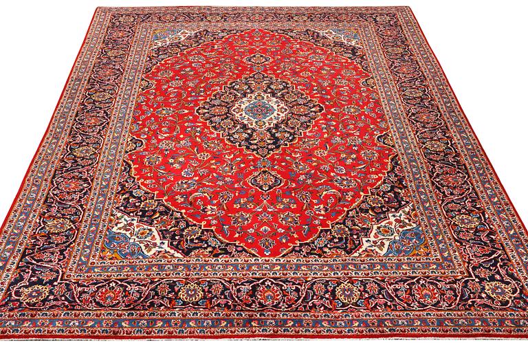 A Keshan carpet, c. 380 x 255 cm.