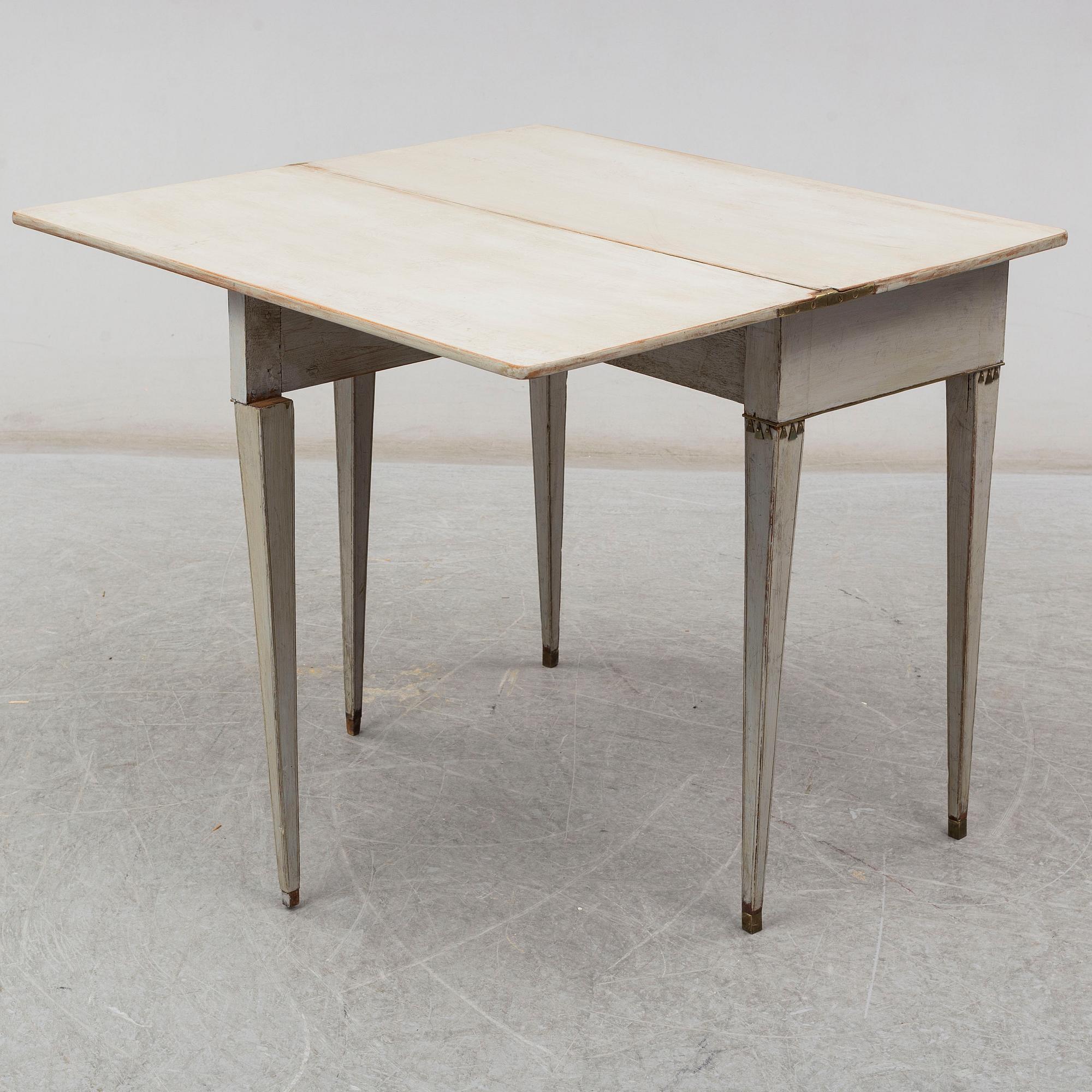 a late gustavian game table from around 1800.