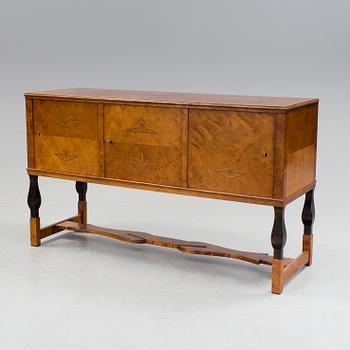 A dining furniture set comprising of eight pieces by Carl Malmsten.