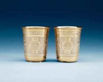 A pair of Russian 19th century silver-gilt beakers, makers mark of Vasily Icanov, Moscow 1893.