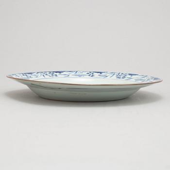 A blue and white plate, Qing dynasty, 18th Century.