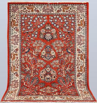 A Sarouk rug, approx. 212 x 140 cm.