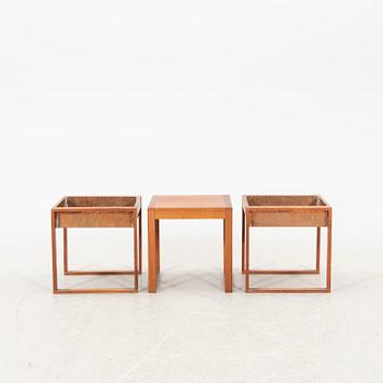 A set of two 1960s teak and copper flower tables and one teak side table.