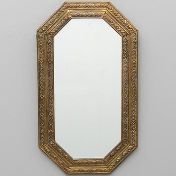 A 20th Century brass framed mirror,