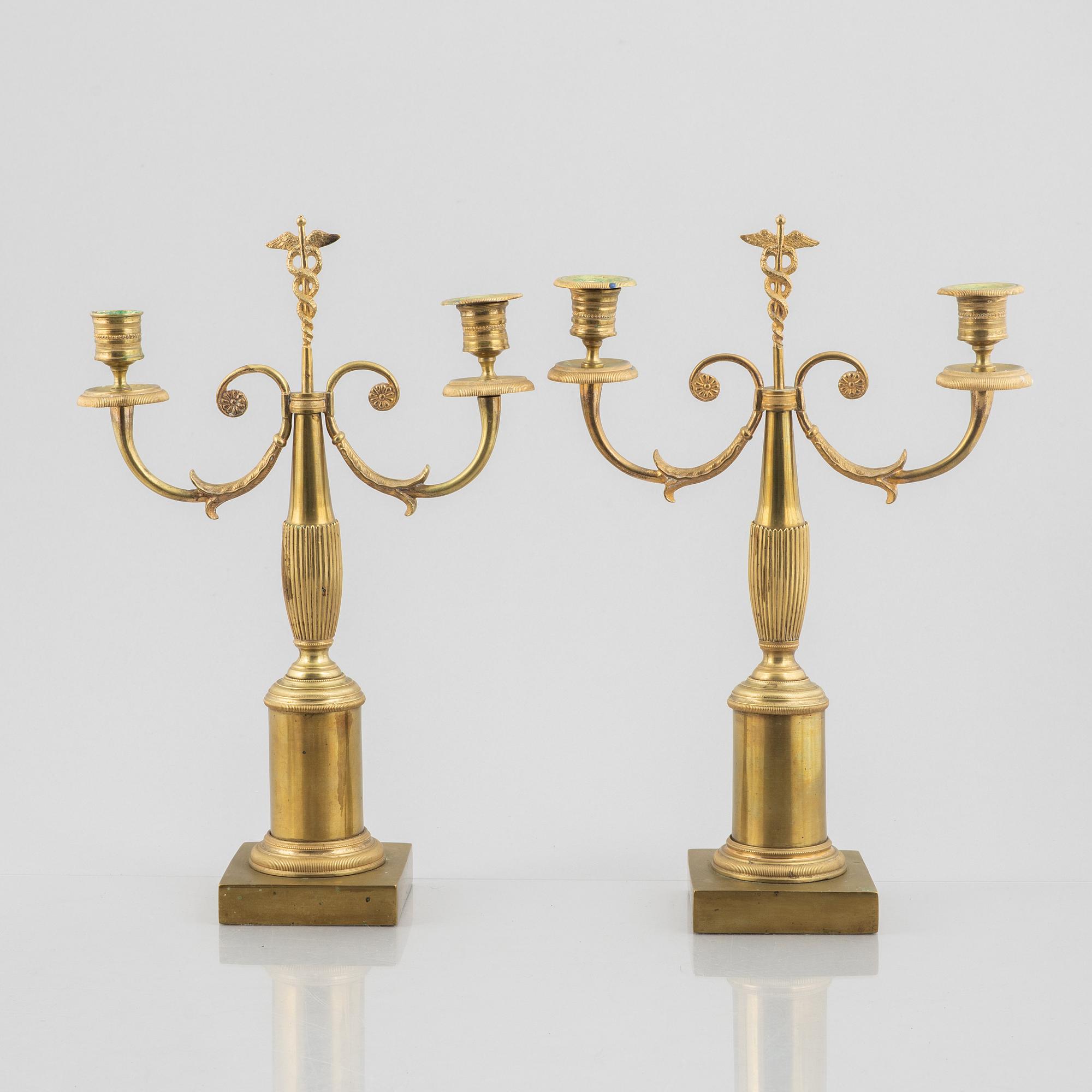 A pair of brass candelabra, first half/mid 19th century.