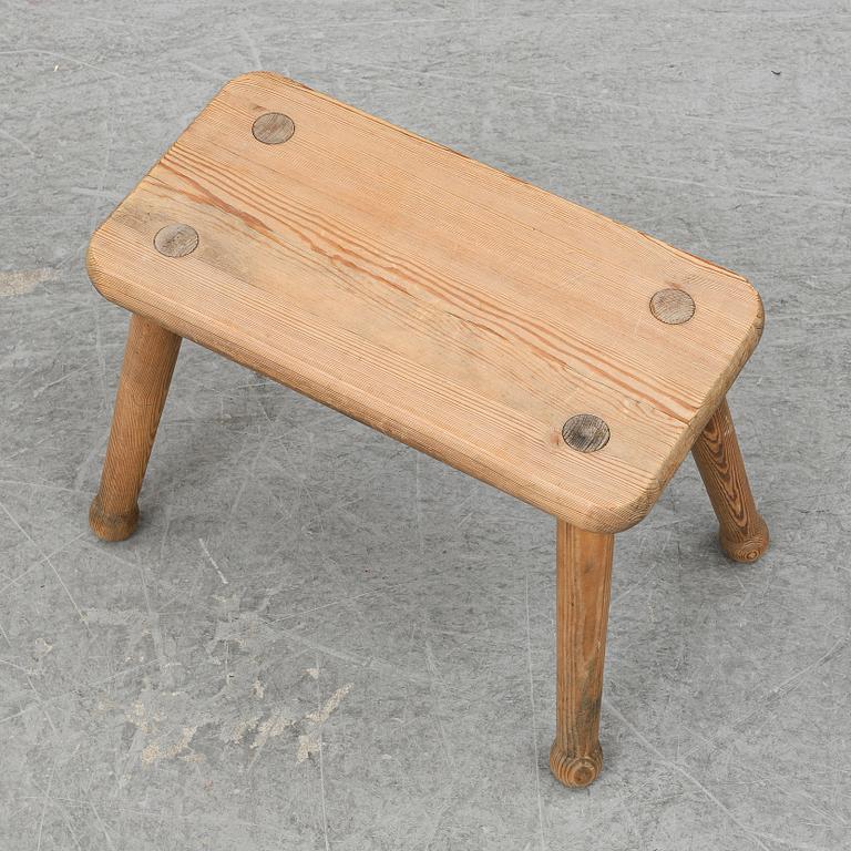 A pine stool, second half of the 20th century.