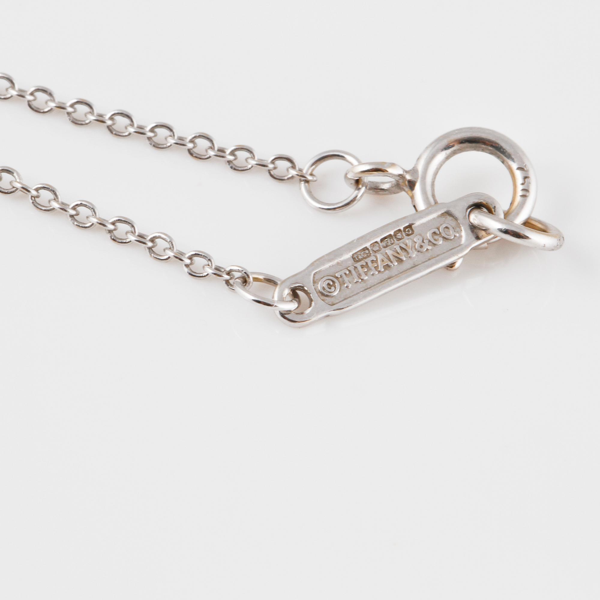 HÄNGE, Tiffany & Co, 18K vitguld med 16 briljantslipade diamanter. Vikt 2,2 gram.