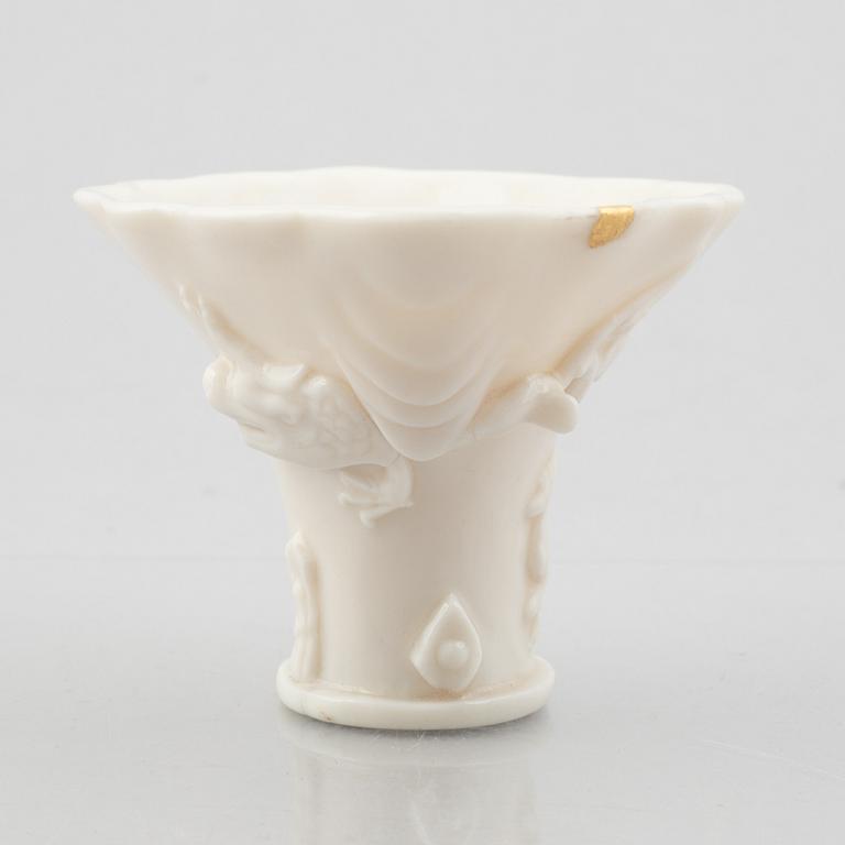 A blanc de chine rhinoceros libation cup, Qing dynasty, Kangxi (1662-1722).