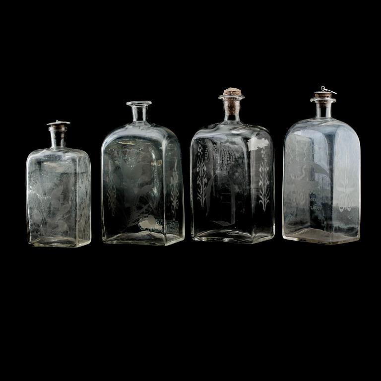 BRÄNNVINSFLASKOR, 4 st, glas, 1800-talets mitt.