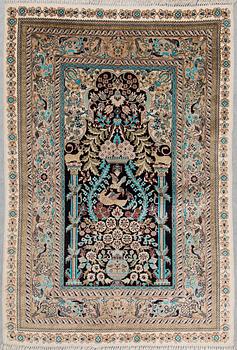 Two chinese silk rugs, around 96 x 63 and 91 x 63 cm.