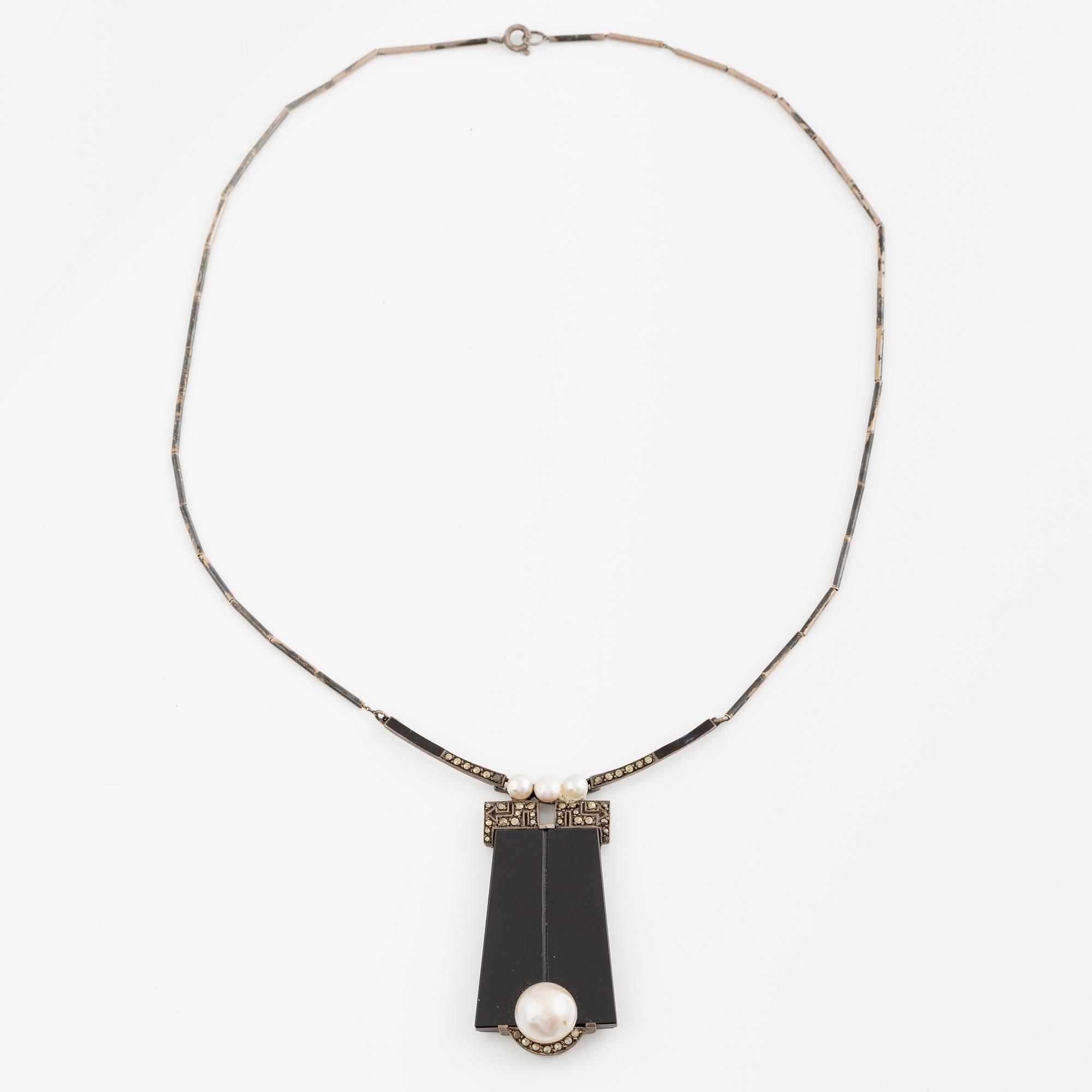 Necklace and a pair of earrings, silver, onyx, mother-of-pearl, and pyrite.