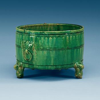 A green glazed tripod censer, presumably Han dynasty.