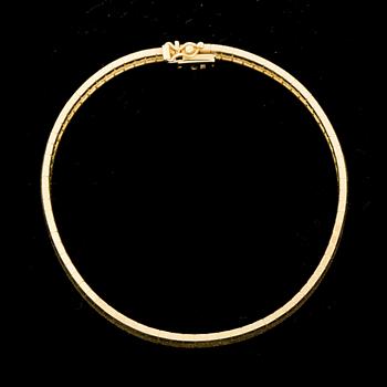 ARMBAND, 18 k guld. Vikt ca 25 g.