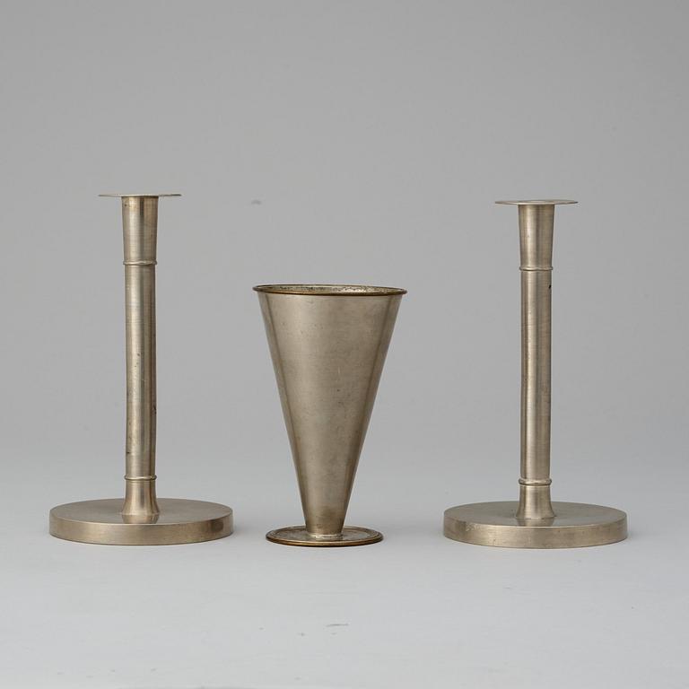 A pewter set probably designed by Björn Trägårdh, a vase and a pair of candlesticks, Svenskt Tenn, Stockholm 1928-29.