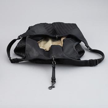 BOTTEGA VENETA, black leather bag.