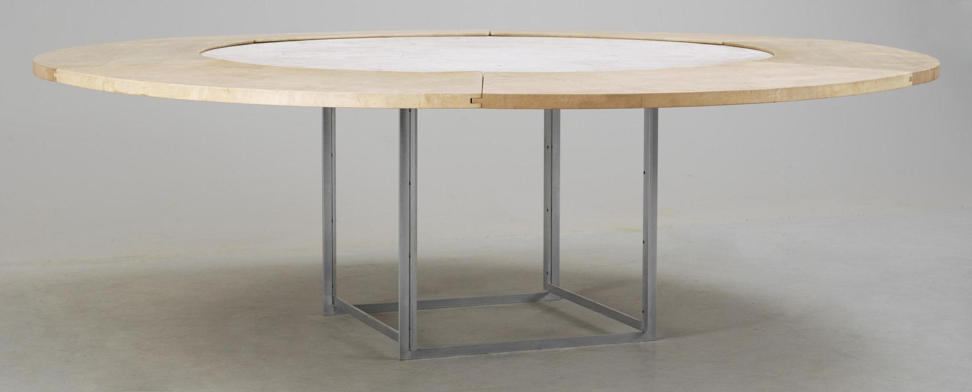 A Poul Kjaerholm marble top 'PK-54' dining table, Fritz Hansen, Denmark 1986.