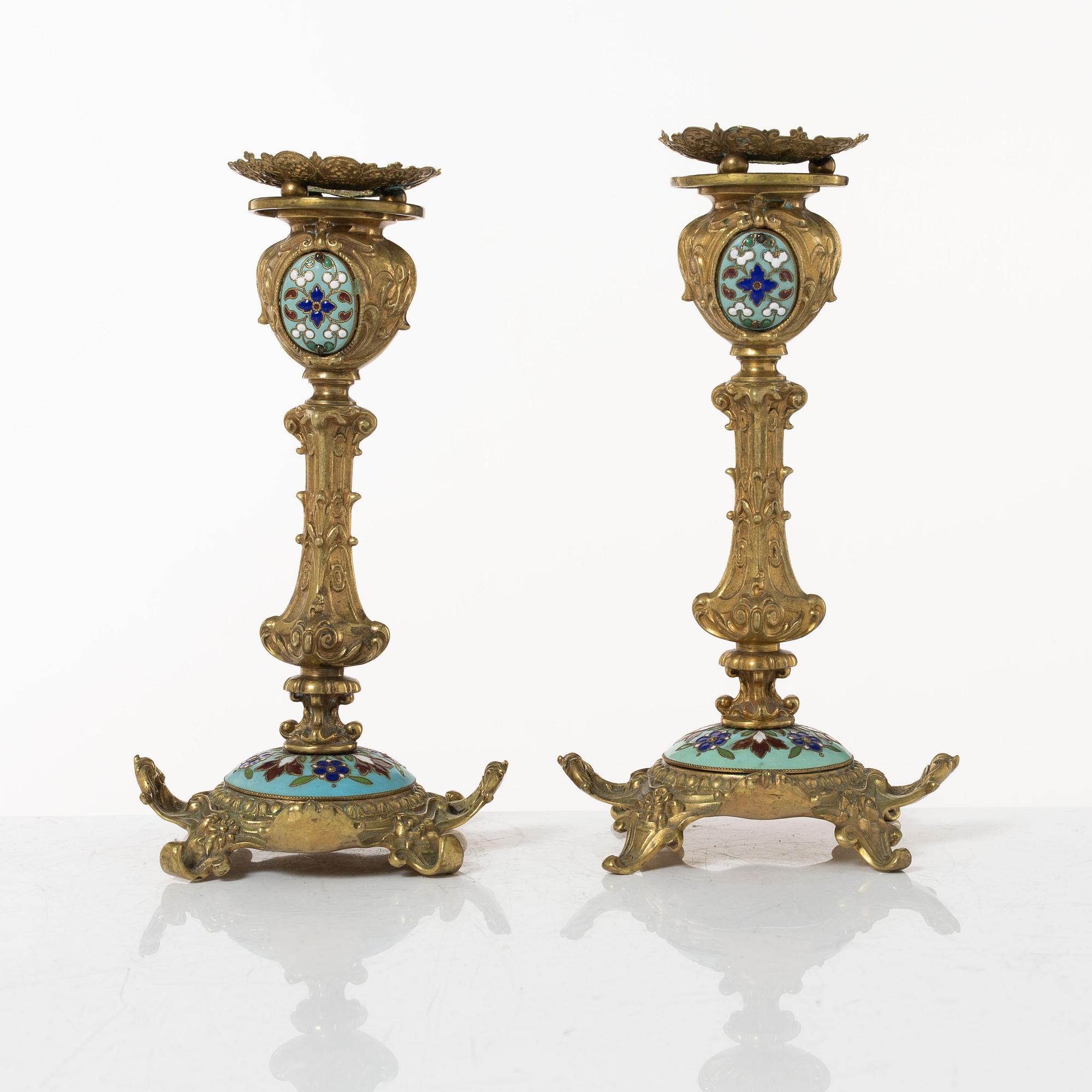 A pair candlesticks and an inkwell, circa 1900.