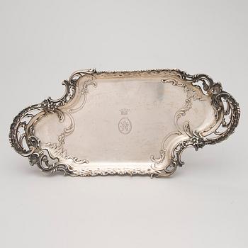 A German silver tray, mark of M.H. Wilkens & Söhne, Austrian import mark, retailer mark of V. Mayers Söhne, 1891-1901.